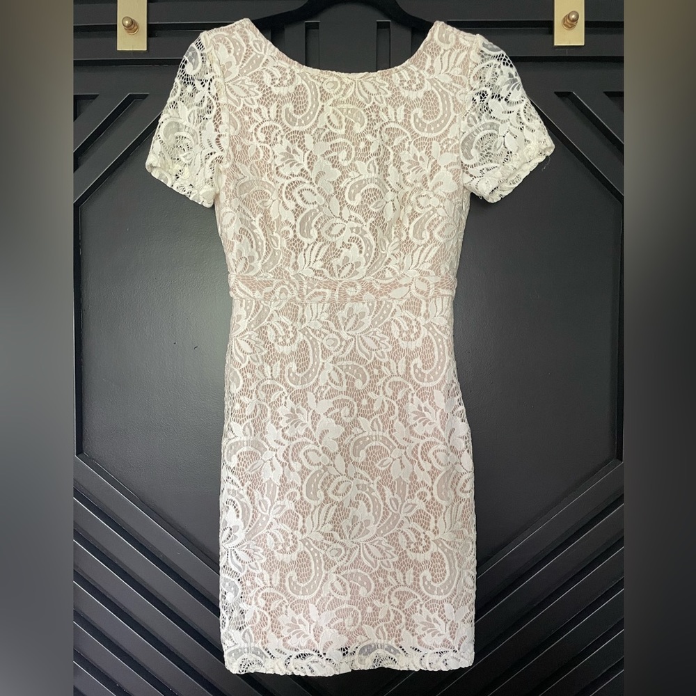 White lace open back mini dress